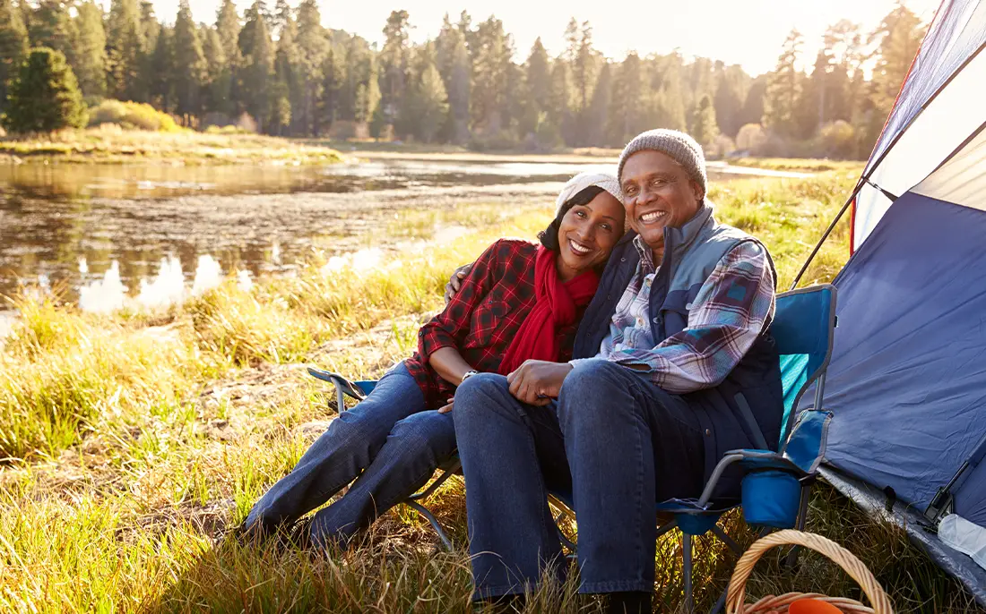 retirees camping by river simple successful retirement